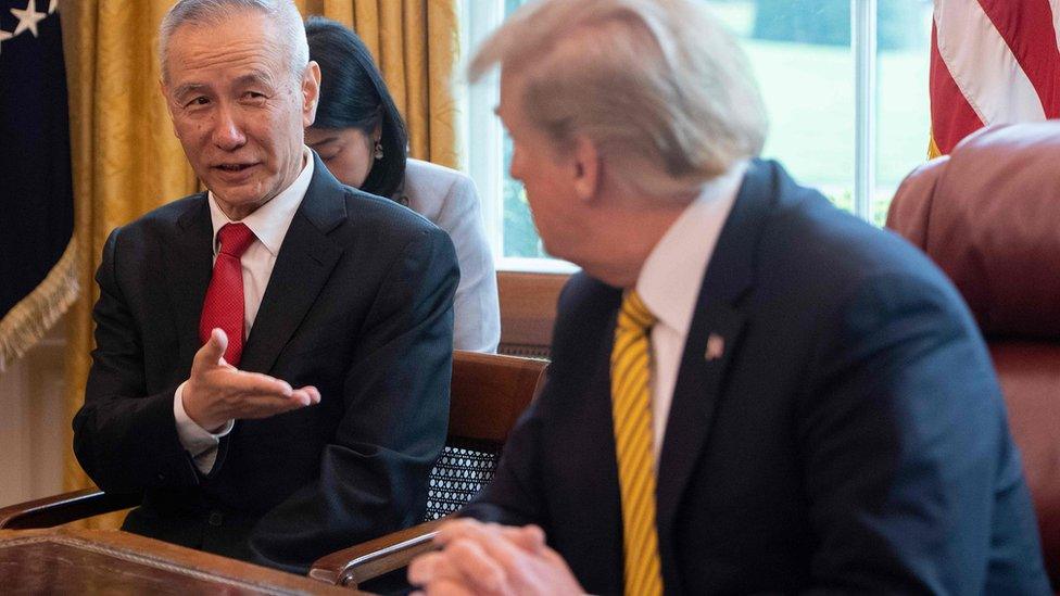 Vice Premier Liu He and President Trump, sitting next to each other