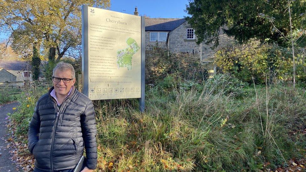 Charlie Bennett standing outside Cherryburn where the famous illustrator Thomas Bewick was born