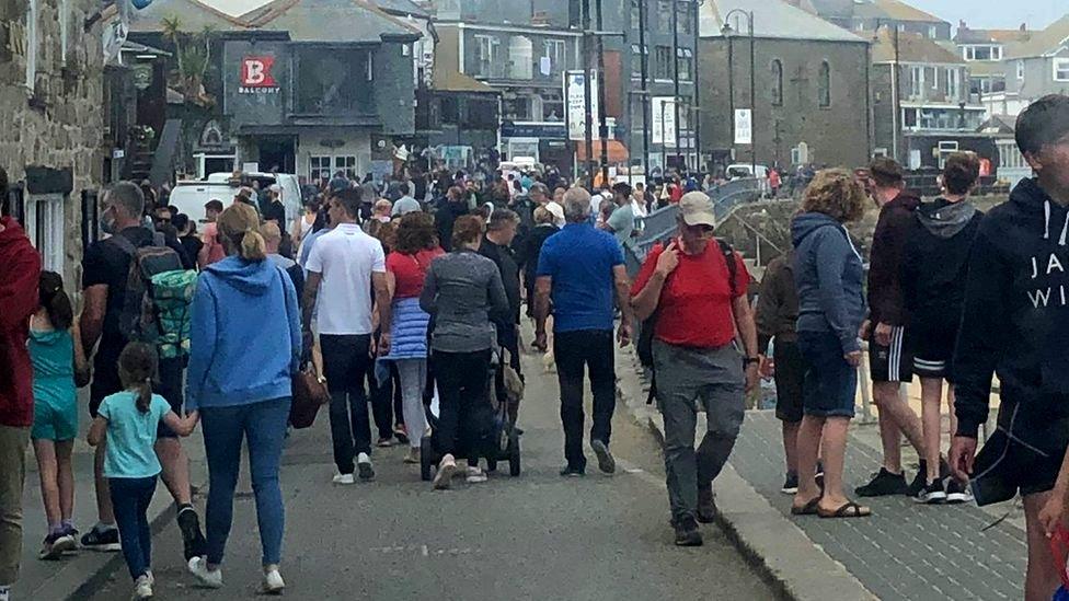 Crowded harbour area in St Ives