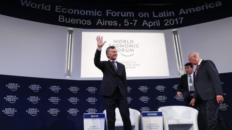 Argentina's President, Mauricio Macri (L) greets the audience next to Klaus M. Schwab (R), Forum's President, during the first day of the World Economic Forum for Latin America in Buenos Aires, Argentina, 06 April 2017.