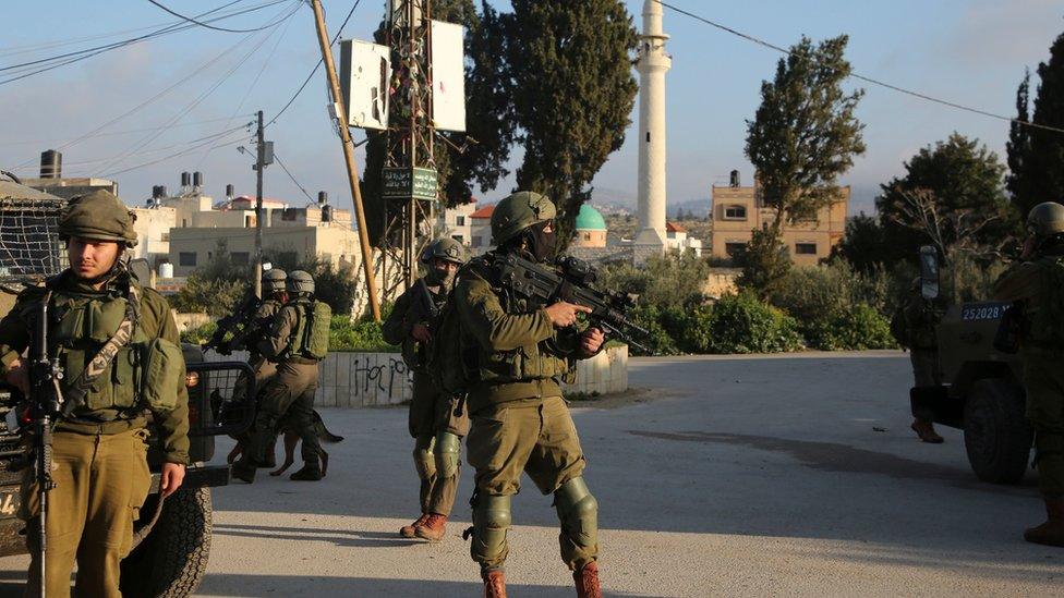 Israeli security forces patrol a street in the West Bank village of Salem on 18 March 2019