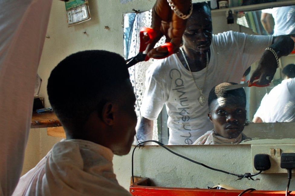 Customer having his hair cut