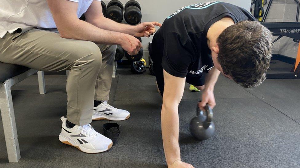 Man doing physiotherapy exercises