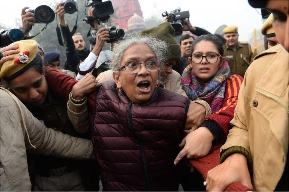 A woman reacts as she confronts police at a demonstration against Indias new citizenship law in New Delhi on December 19, 2019