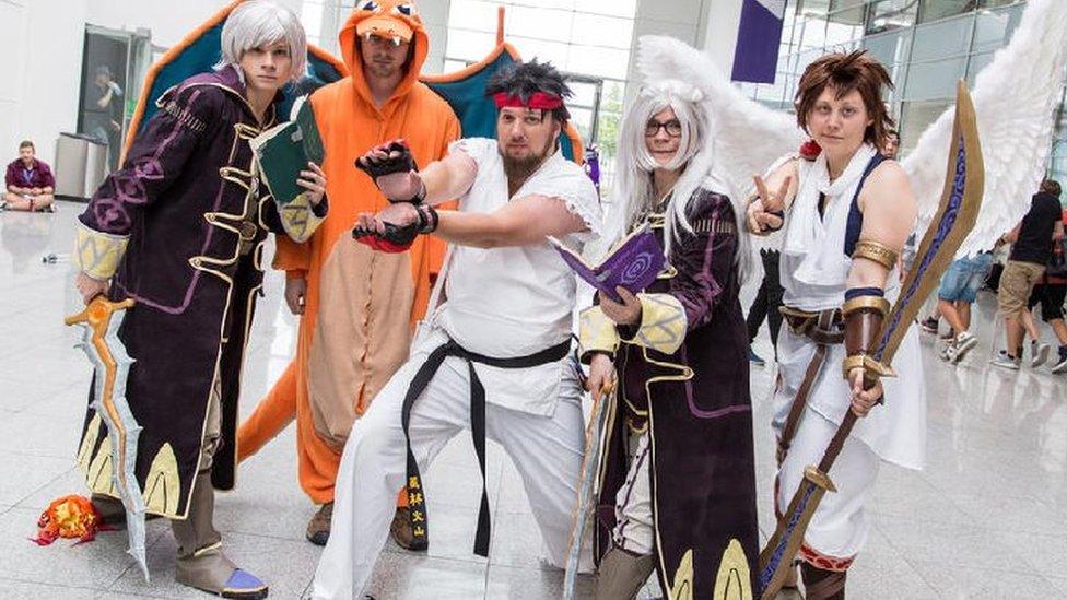 Five gamers dressed as characters