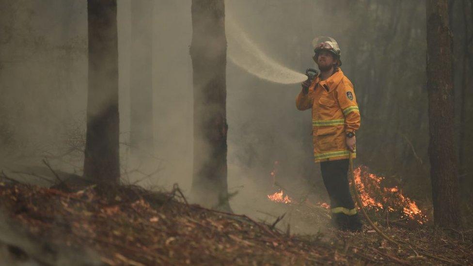 A-firefighter-tackles-blaze.