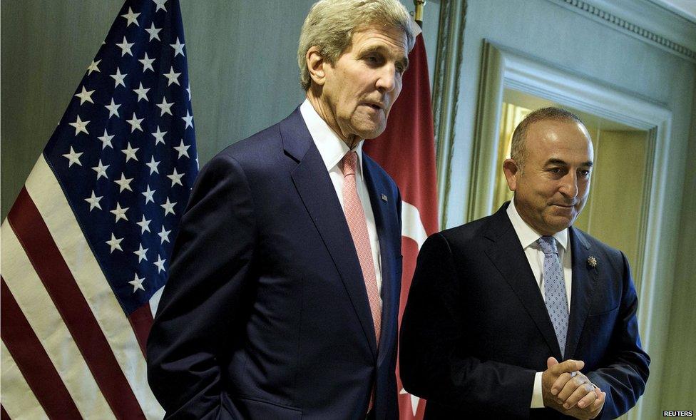 Turkish Foreign Minister Mevlut Cavusoglu and US Secretary of State John Kerry in Malaysia on 5 August 2015