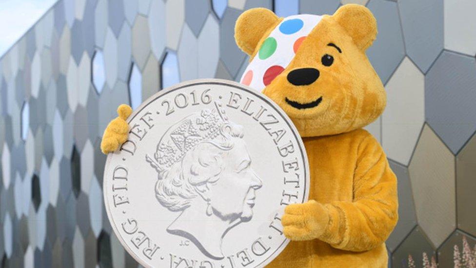 Pudsey with a large old-style pound coin