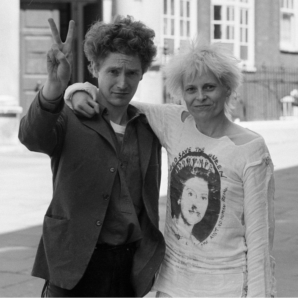 Punk rock group "Sex Pistols" manager Malcolm McLaren and friend designer Viviane Westwood seen here outside Bow Street Magistrate Court, after being remanded on bail for fighting.