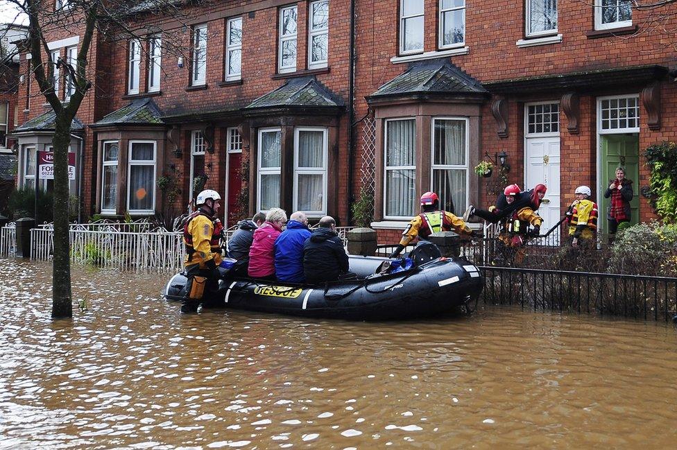 A dinghy crew rescue householders in Carlisle