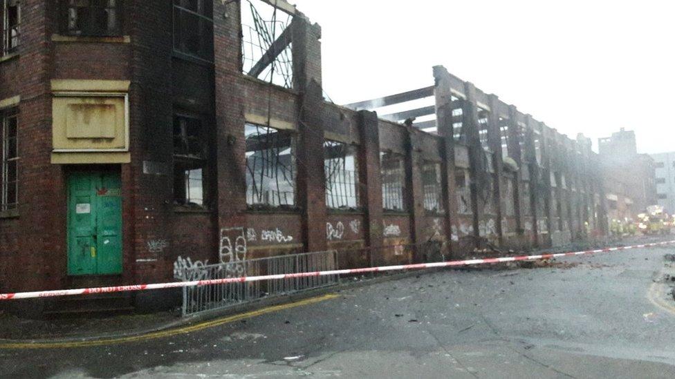 Aftermath of fire at derelict building