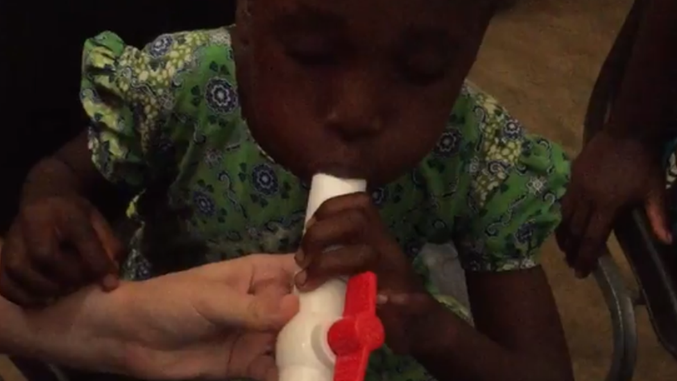 Child in Malawi doing the test