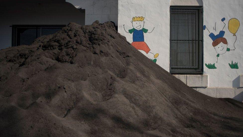 The picture shows the Taburiente Public School on the island covered with ash following the eruption.