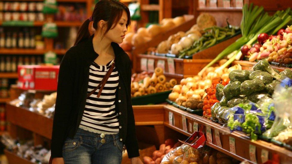 Woman shopping in Scotland supermarket