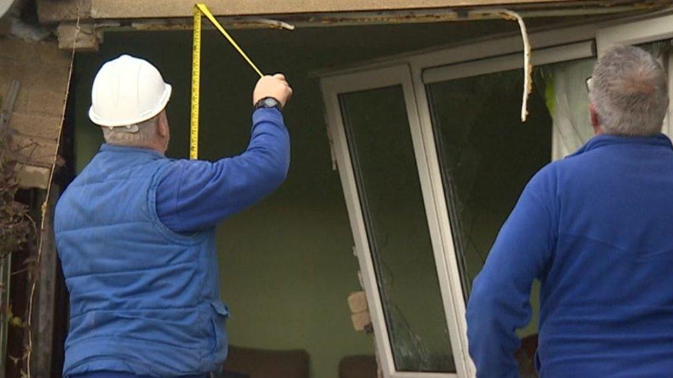 Builders at house after car crash