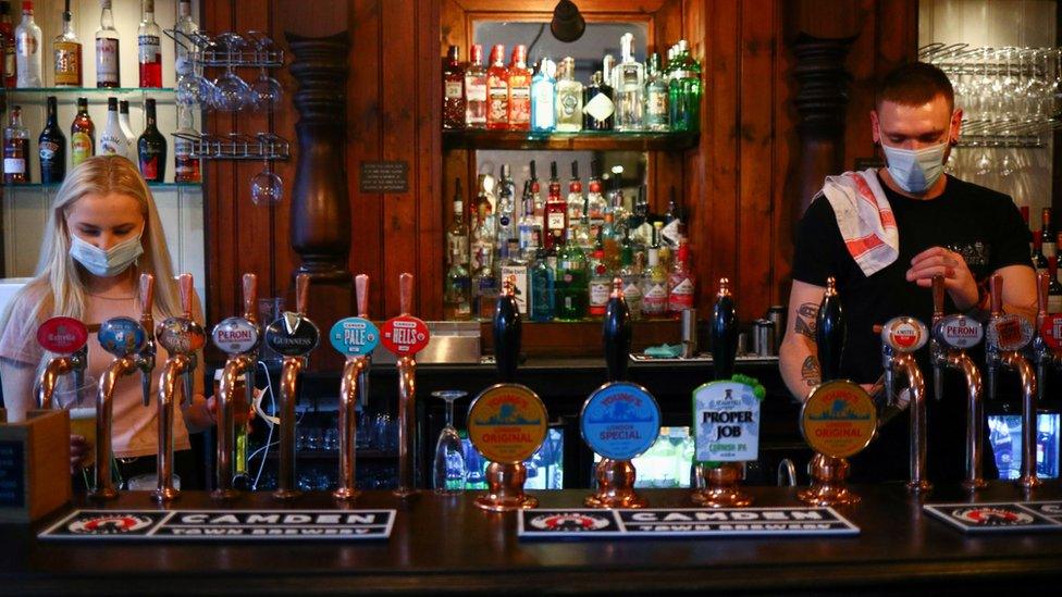 Masked bar staff in UK pub