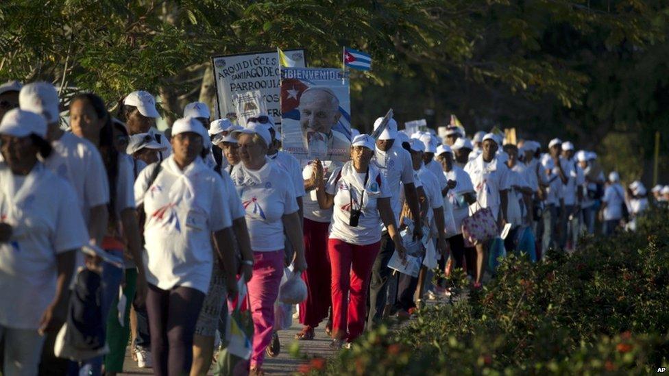 People arrive for the Pope's mass in Holguin