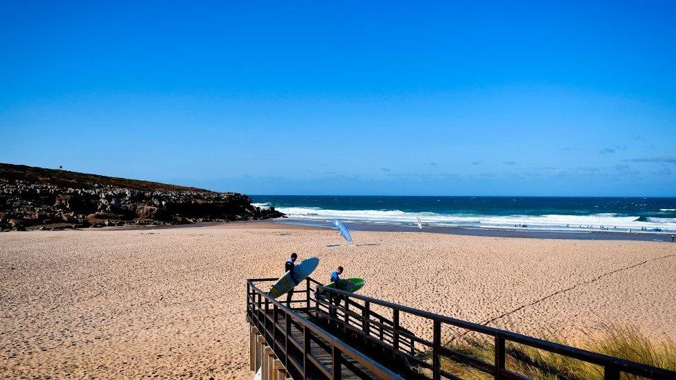 Surfers, Foz do Lizandro beach in Ericeira