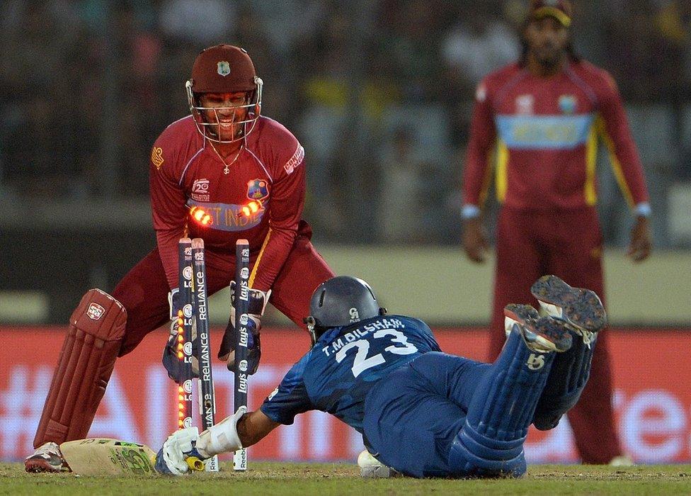 Sri Lanka batsman Tillakaratne Dilshan struggles to make his ground as the bails fly off the stumps