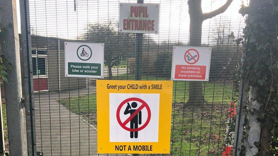 Sign posted on school gate