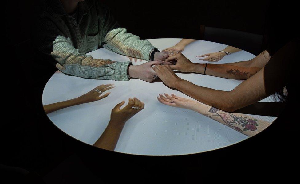 hands on projected table