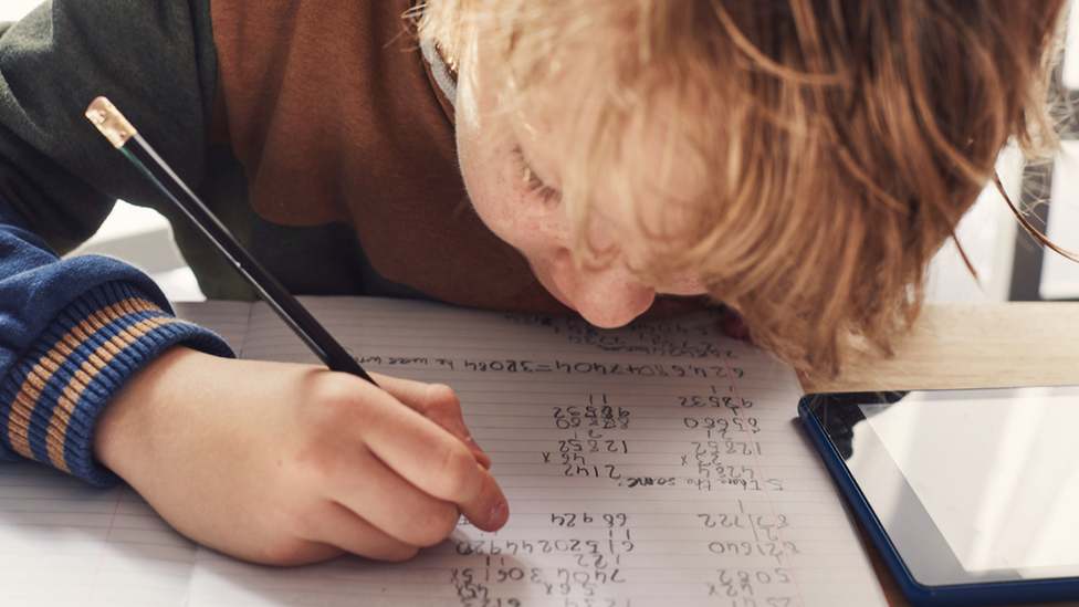 Pupil doing maths