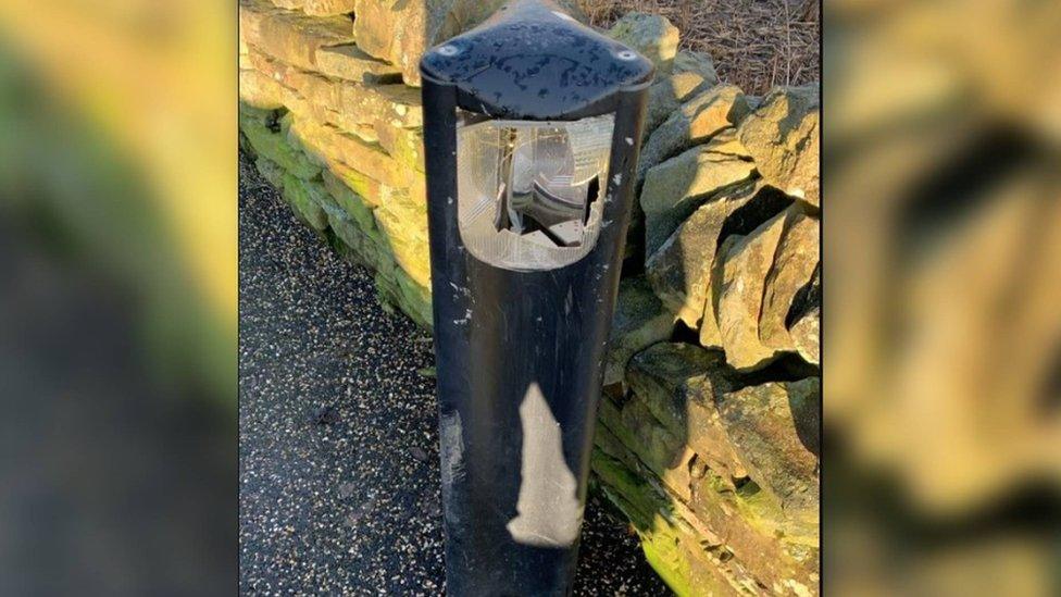 A damaged bollard