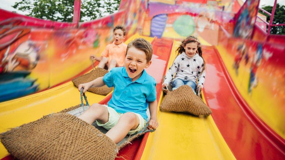 children-at-theme-park.