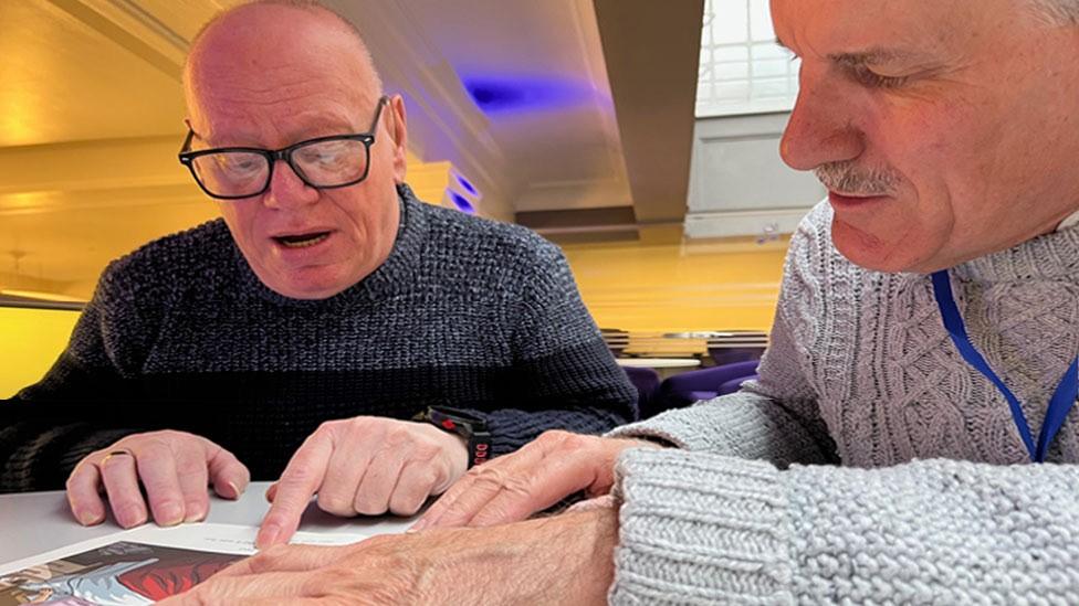 Graham, left, pictured with his Read Easy coach Geoff Bell