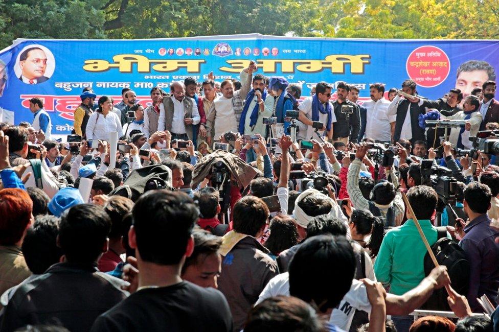 Mr Azad addressing the crowd at a rally in Delhi