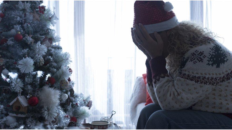 Woman alone at Christmas