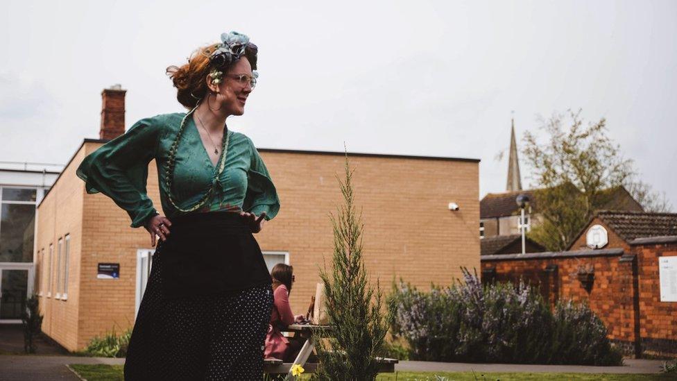 woman in green dress