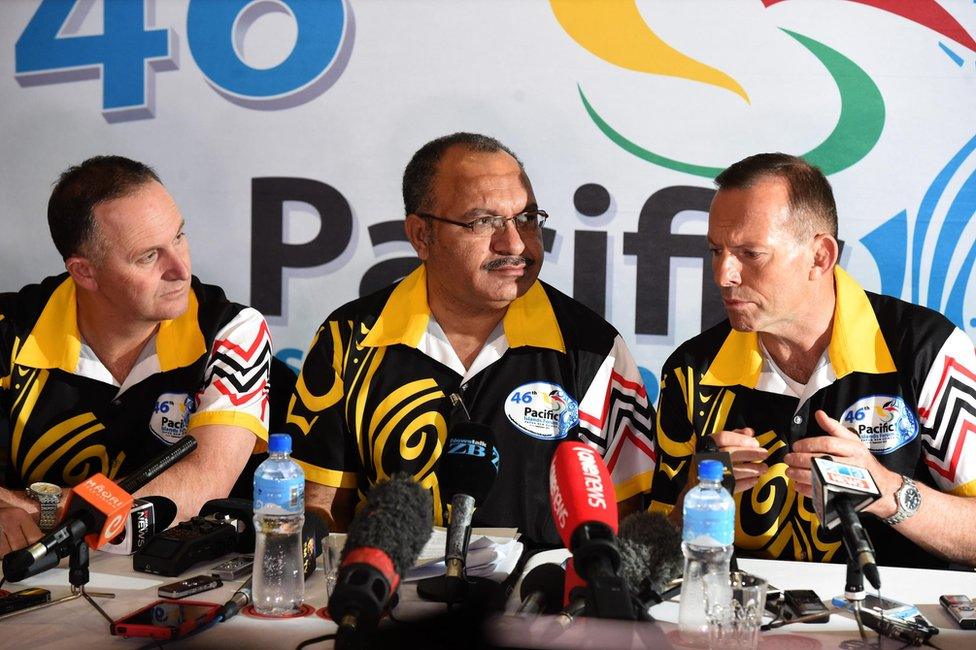 A picture made available on 11 September 2015 shows (L-R) New Zealand's Prime Minister John Key, Papua New Guinea's Prime Minister Peter O'Neill and Australia's Prime Minister Tony Abbott at a press conference after the main meeting of the Pacific Islands Forum in Port Moresby, Papua New Guinea, 10 September 2015.