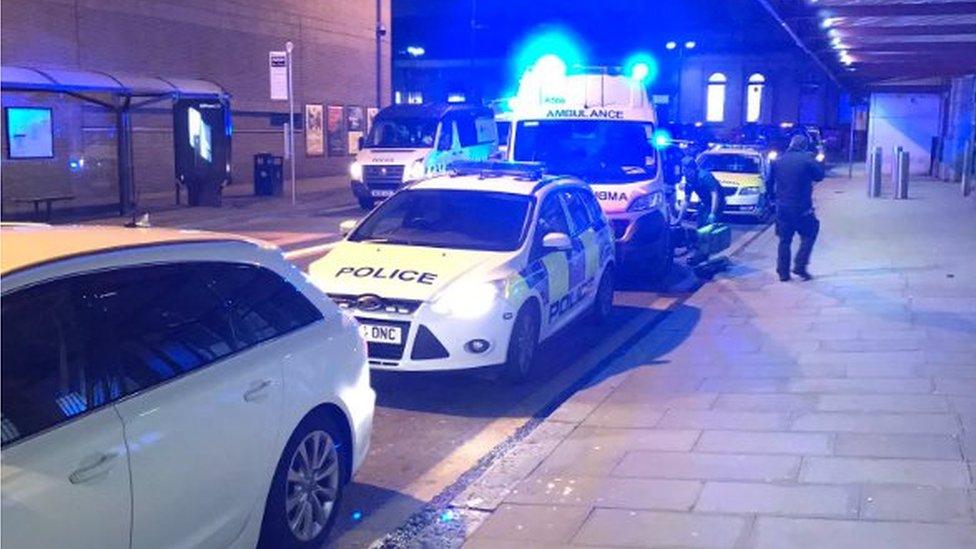 Police cars outside Manchester Victoria