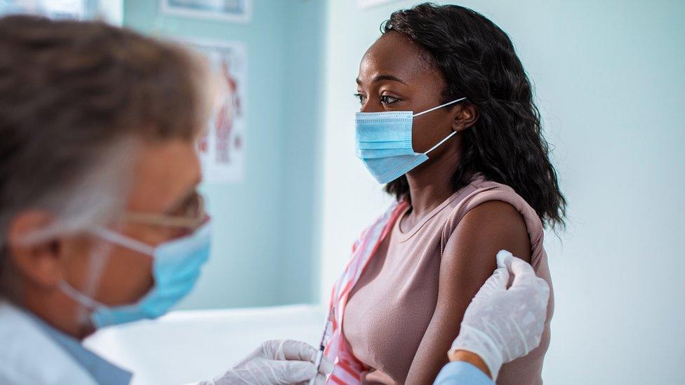 Person getting vaccine