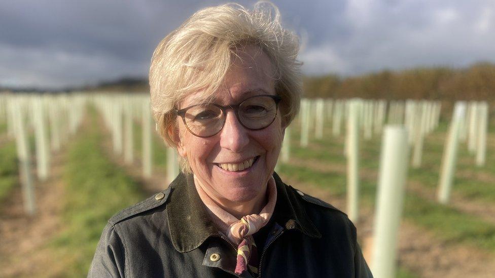 Wiltshire Councillor Bridget Wayman standing in front of the first trees to be planted on the Cranborne Chase site