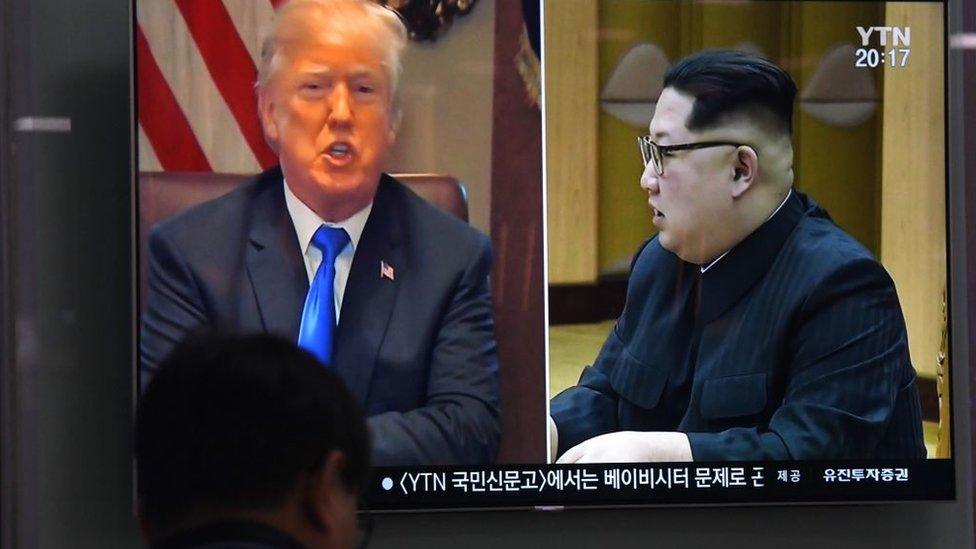 A South Korean news show broadcasts images of Donald Trump and Kim Jong-un side by side