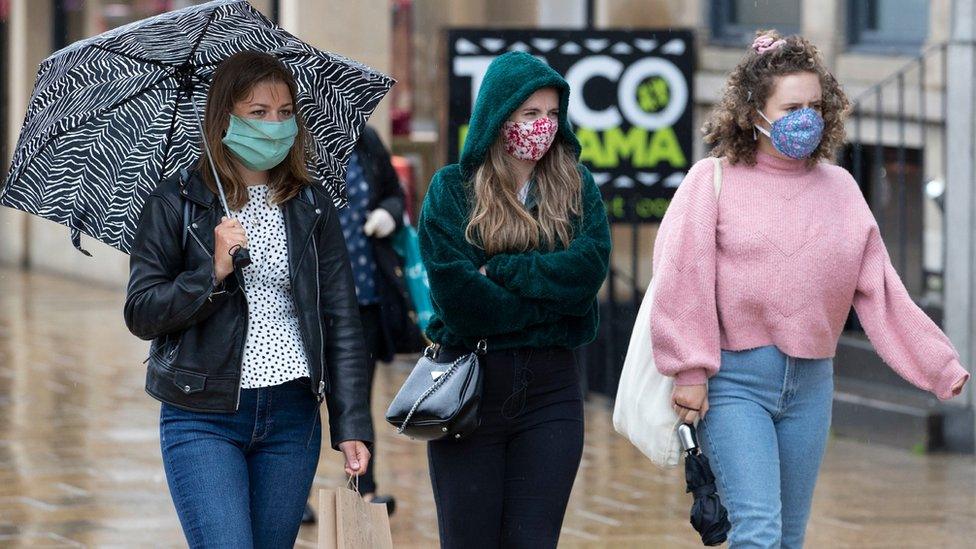 women wearing face coverings