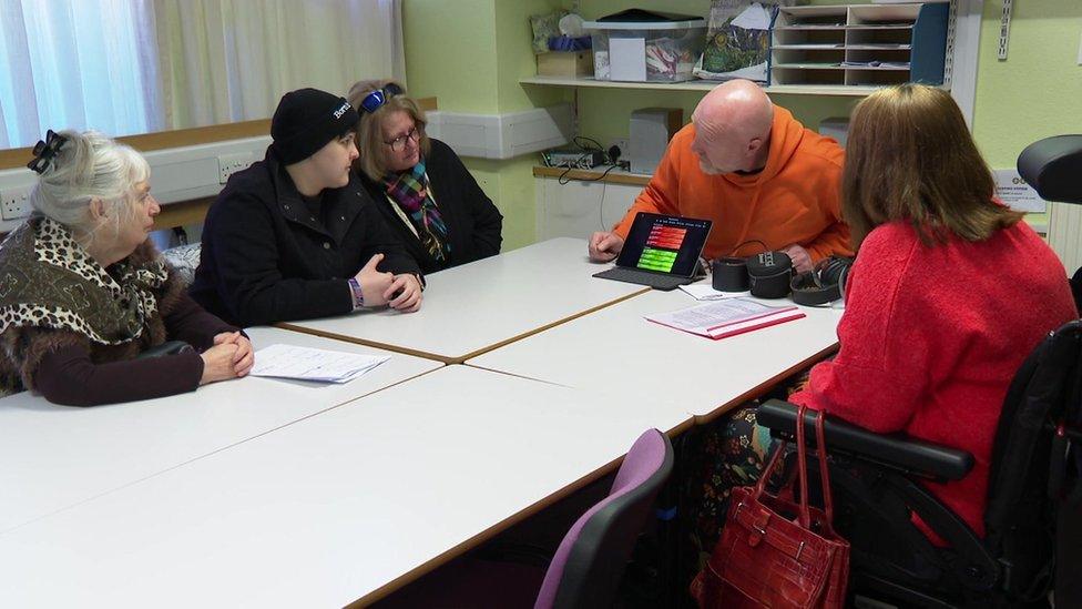 A group of people sat at a table