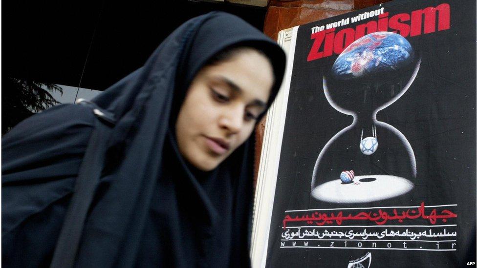 Girl leaves an anti-Zionist conference in Tehran (Oct 2005)