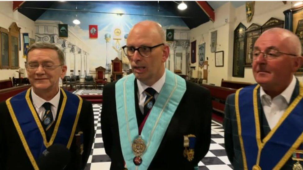 Three Freemasons