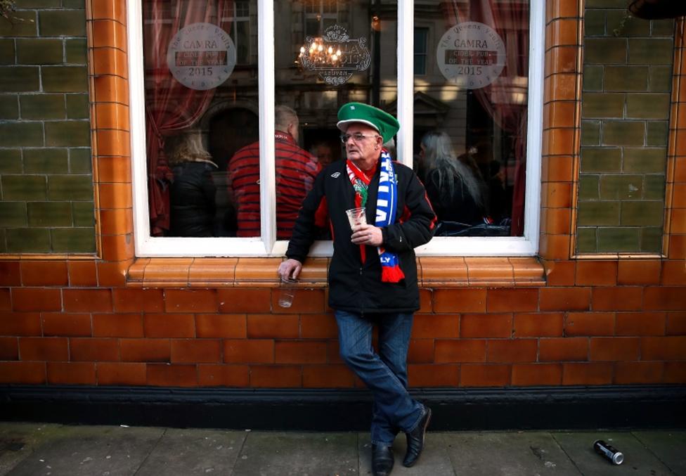 A fan in the build-up to the Wales v Italy match