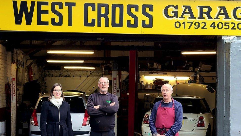 West Cross councillor Rebecca Fogarty, Ripples owner Dennis Dwyer and West Cross Garage owner Mike Wimmers outside garage