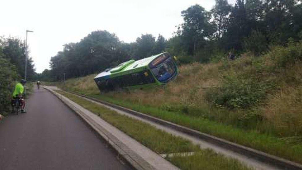 Image of the bus on the causeway