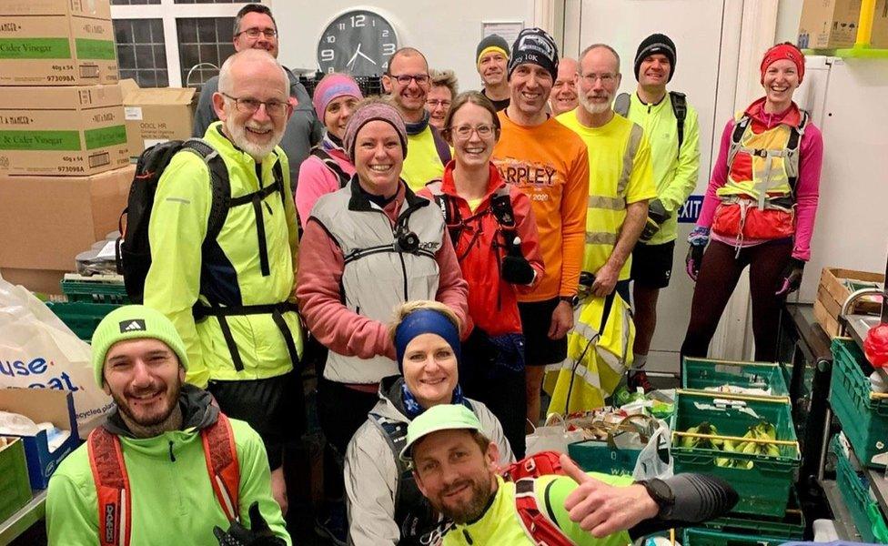 Felixstowe Road Runners at the Salvation Army food bank in the town