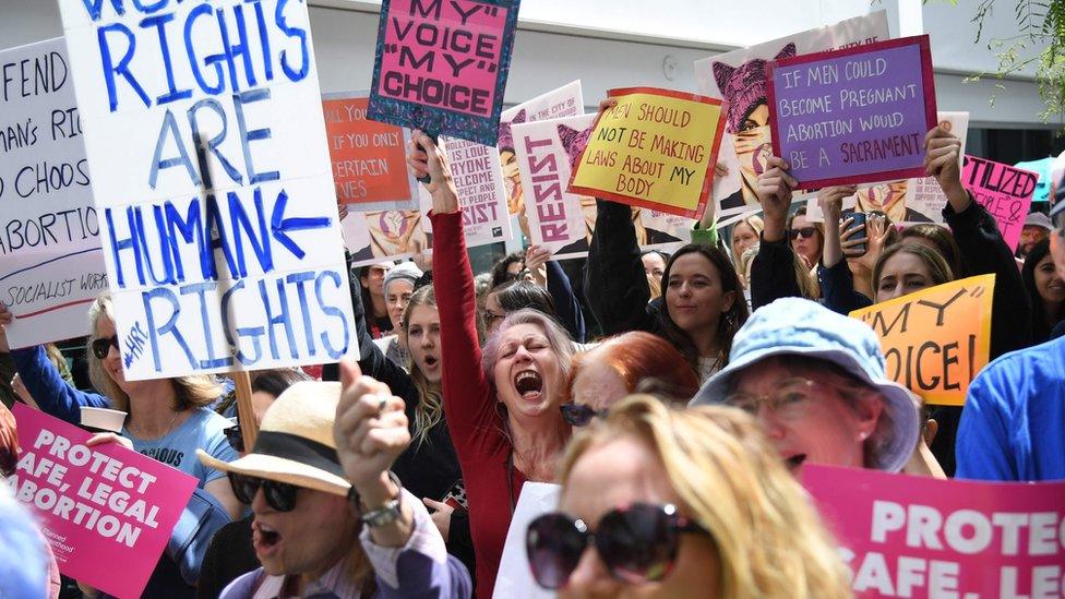 Abortion rights advocates rally to protest against new restrictions on abortions in West Hollywood, California