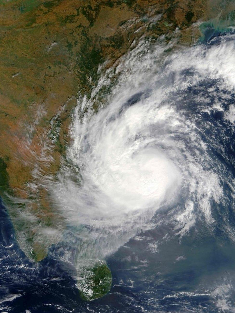 This December 11, 2016 NASA satellite image shows Tropical Cyclone Vardah (05B) approaching India. Vardah, currently over the Bay of Bengal will make landfall near Chennai on December 12,