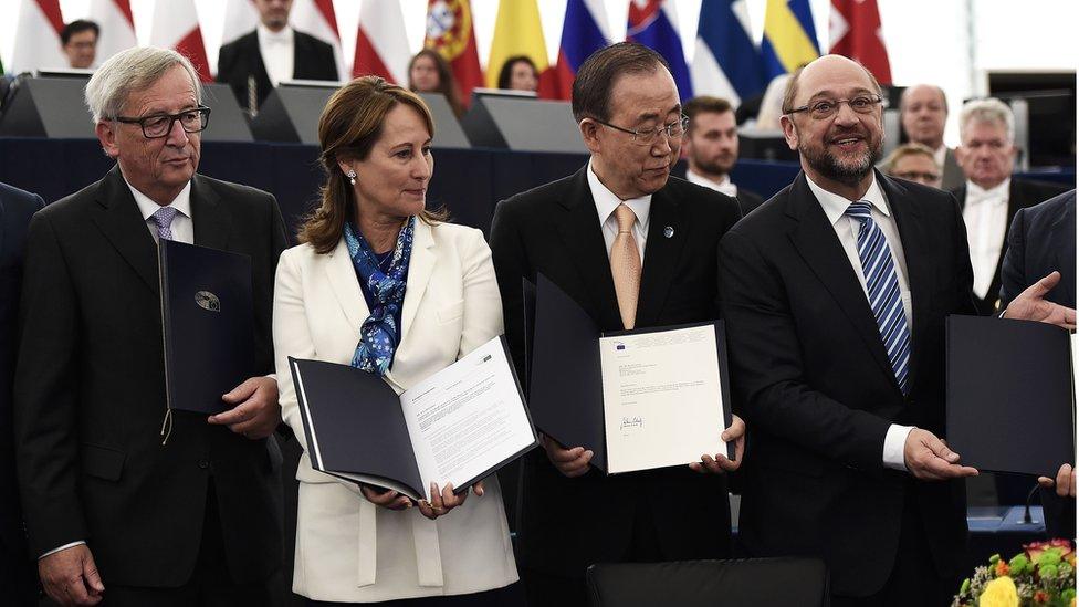 ) European Commission's President Jean-Claude Juncker, France's Minister for Ecology, Sustainable Development and Energy Segolene Royal, UN Secretary-General Ban Ki-moon, and European Parliament President Martin Schulz pose after EU ratification of the UN Climate Change agreement struck in Paris last year at the European Parliament in Strasbourg, eastern France, on October 4, 2016