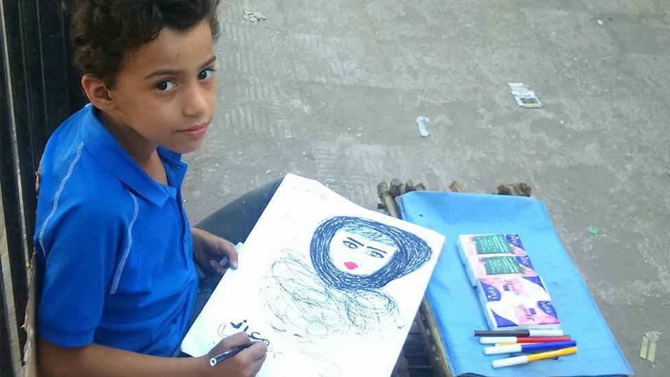 Moaz with a drawing