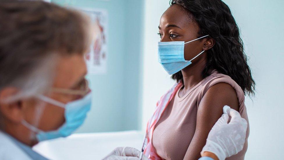 woman receiving injection